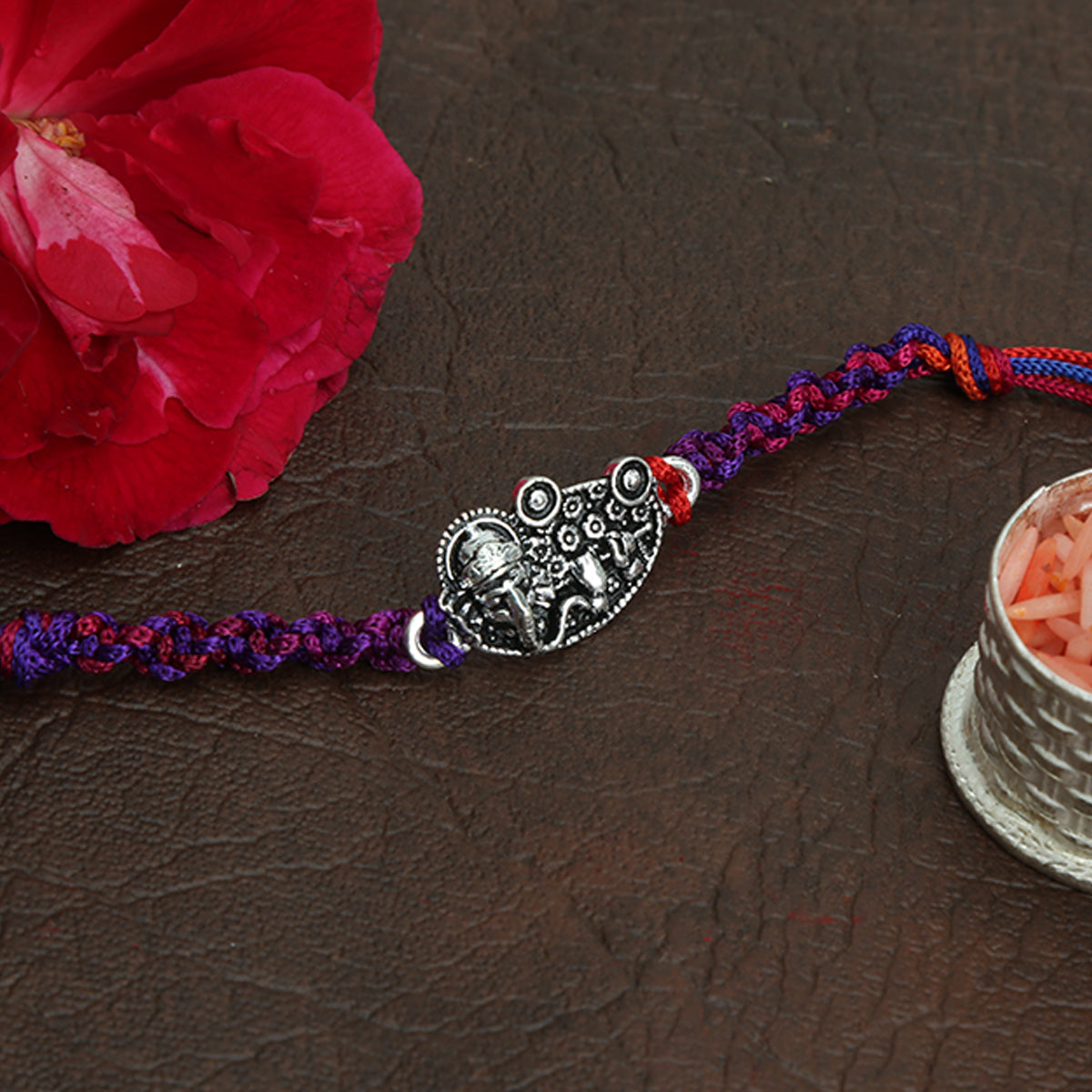 Dual Tone Ganpati Motif Rakhi